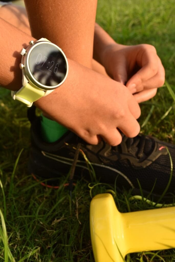 Ultimate Numerology And Fitness Guide 11 Ultimate Numerology And Fitness Guide a close up of a person wearing a watch on their wrist