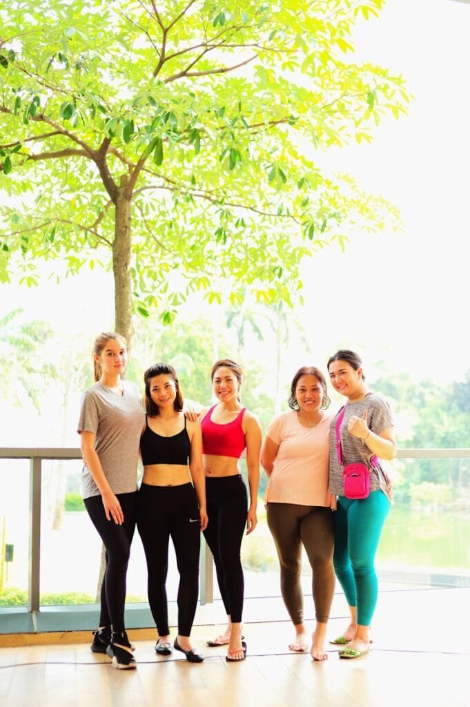 Ultimate Numerology And Fitness Guide 6 Ultimate Numerology And Fitness Guide a group of women posing for a photo under a tree